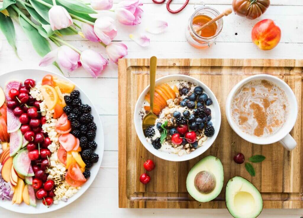 a selection of healthy foods on a plate and bowl