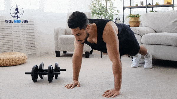 a man doing push ups in a living room