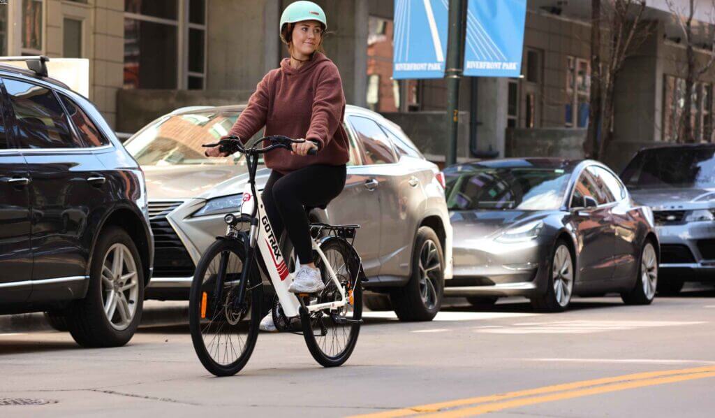 a woman on an electric bike