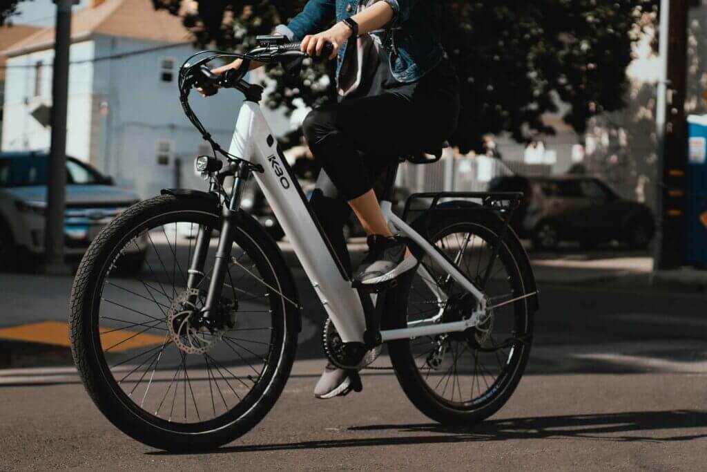 a woman cycling an electric bike