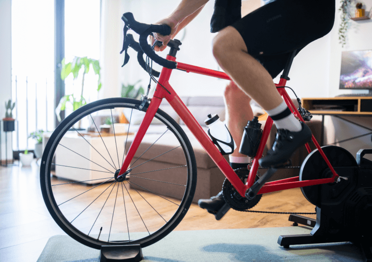 a man on an indoor cycling turbo trainer