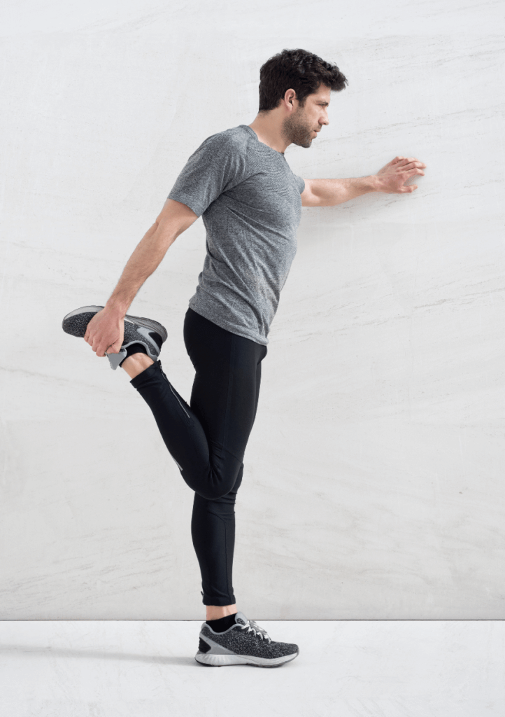 a man doing a Quadriceps Stretch