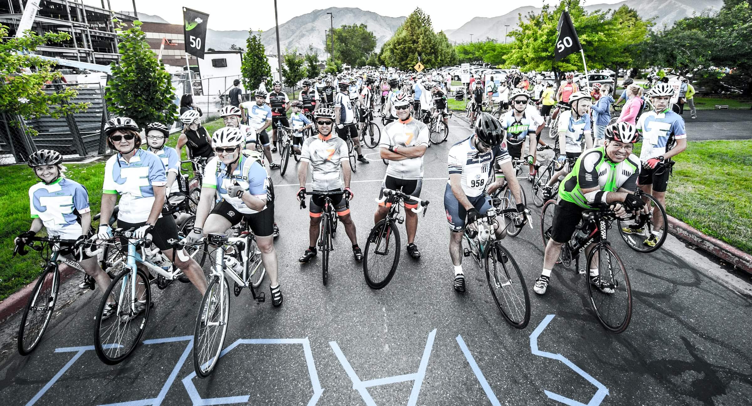 a group of cyclists on the start line of a sportive cycle