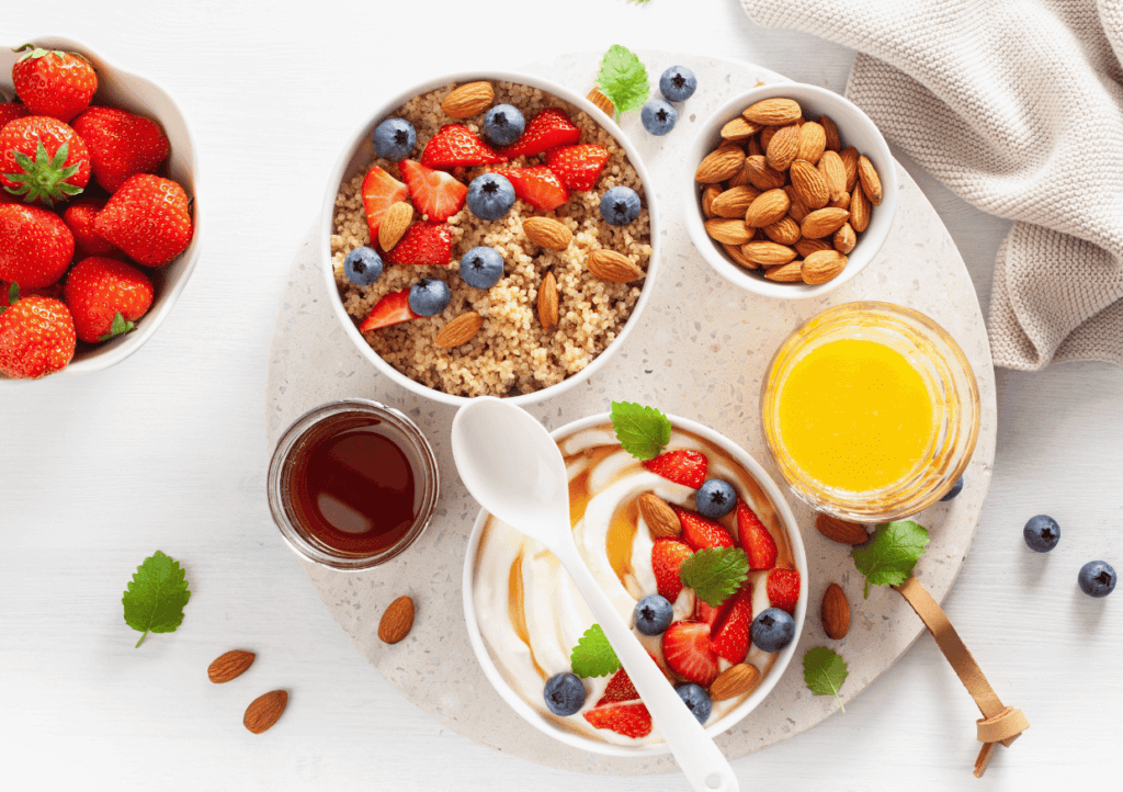 yogurt with strawberry blueberry honey almond and quinoa for breakfast