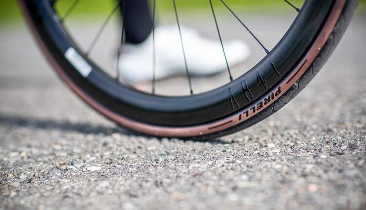 a close up of a tubeless bike tyre on the road