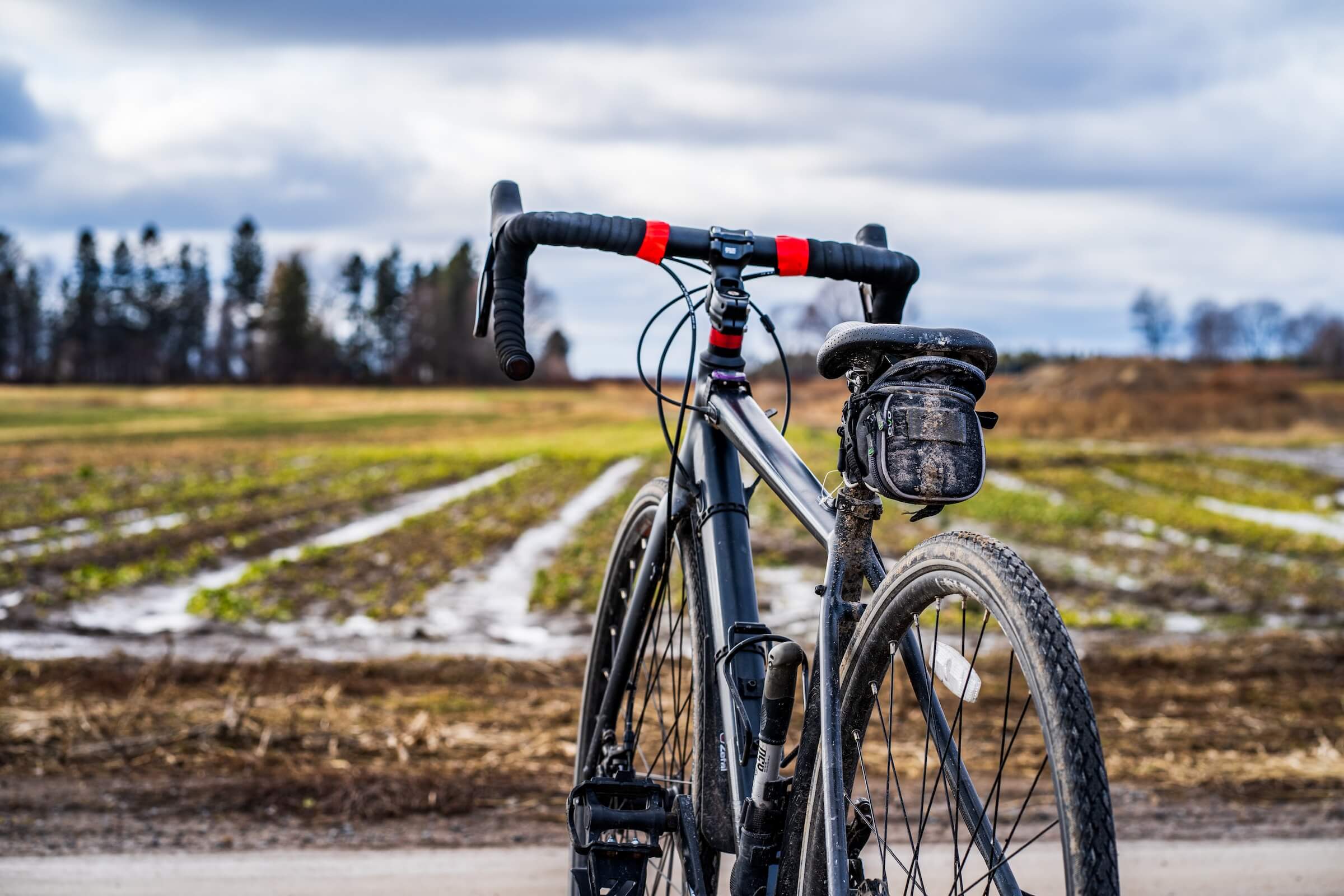 black bicycle a bit dirty from winter riding