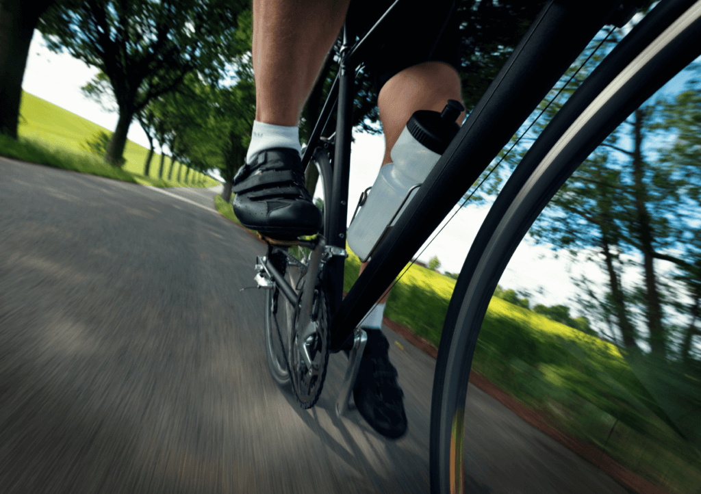 close up of a cyclists feet pedalling a bike